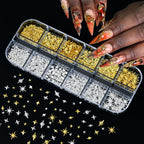 Arrangement of nail jewels and acrylic charms in storage boxes
