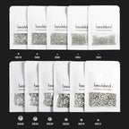Hand holding pack of Beadsland flat back round gems