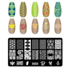 Top down view of flower and butterfly nail design stencils