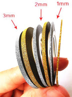 Close up of 1mm 2mm and 3mm gold and silver nail tape rolls