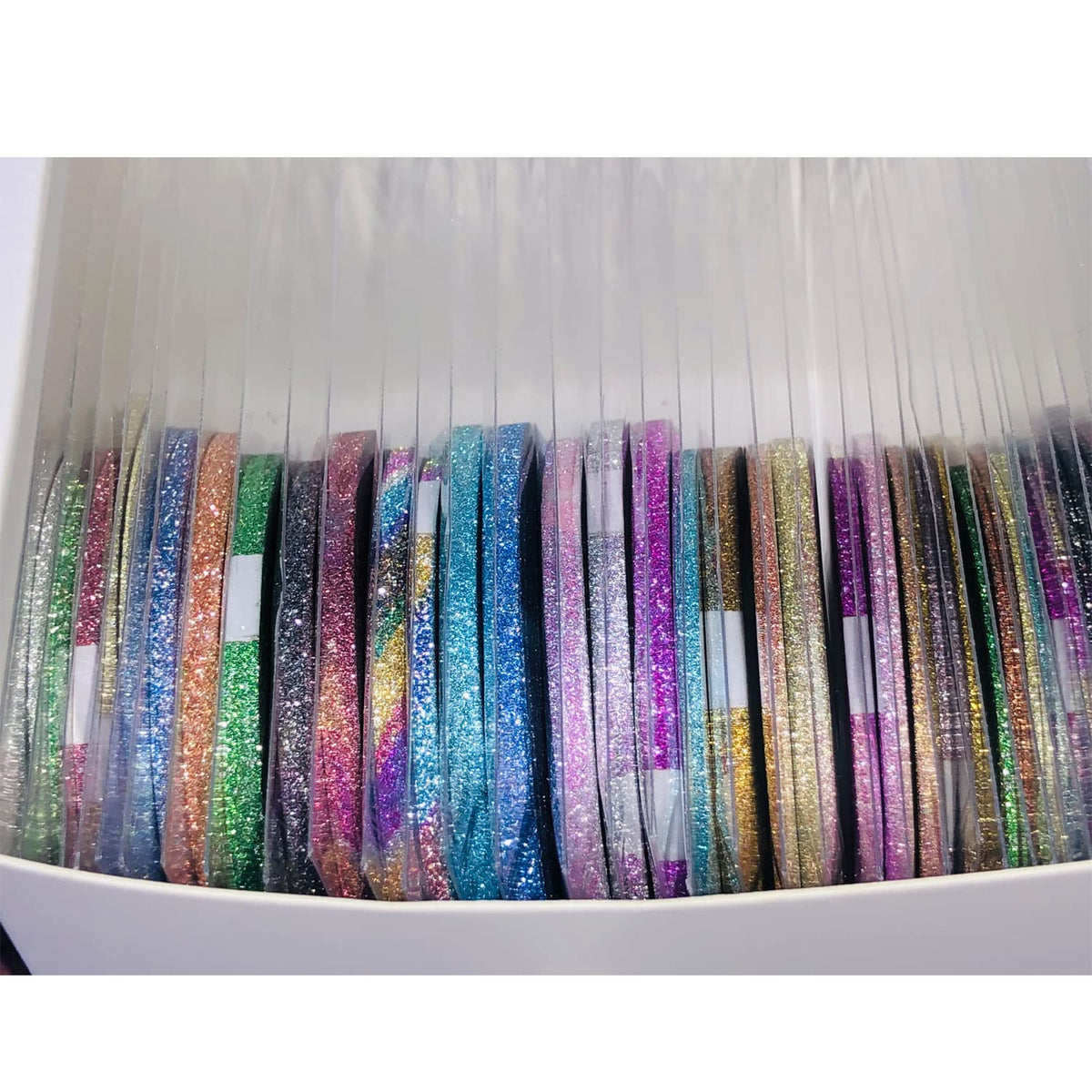 Professional nail art tools including gold and silver striping tape