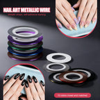 A finished salon-quality manicure showcasing geometric lines and dot details created with this kit