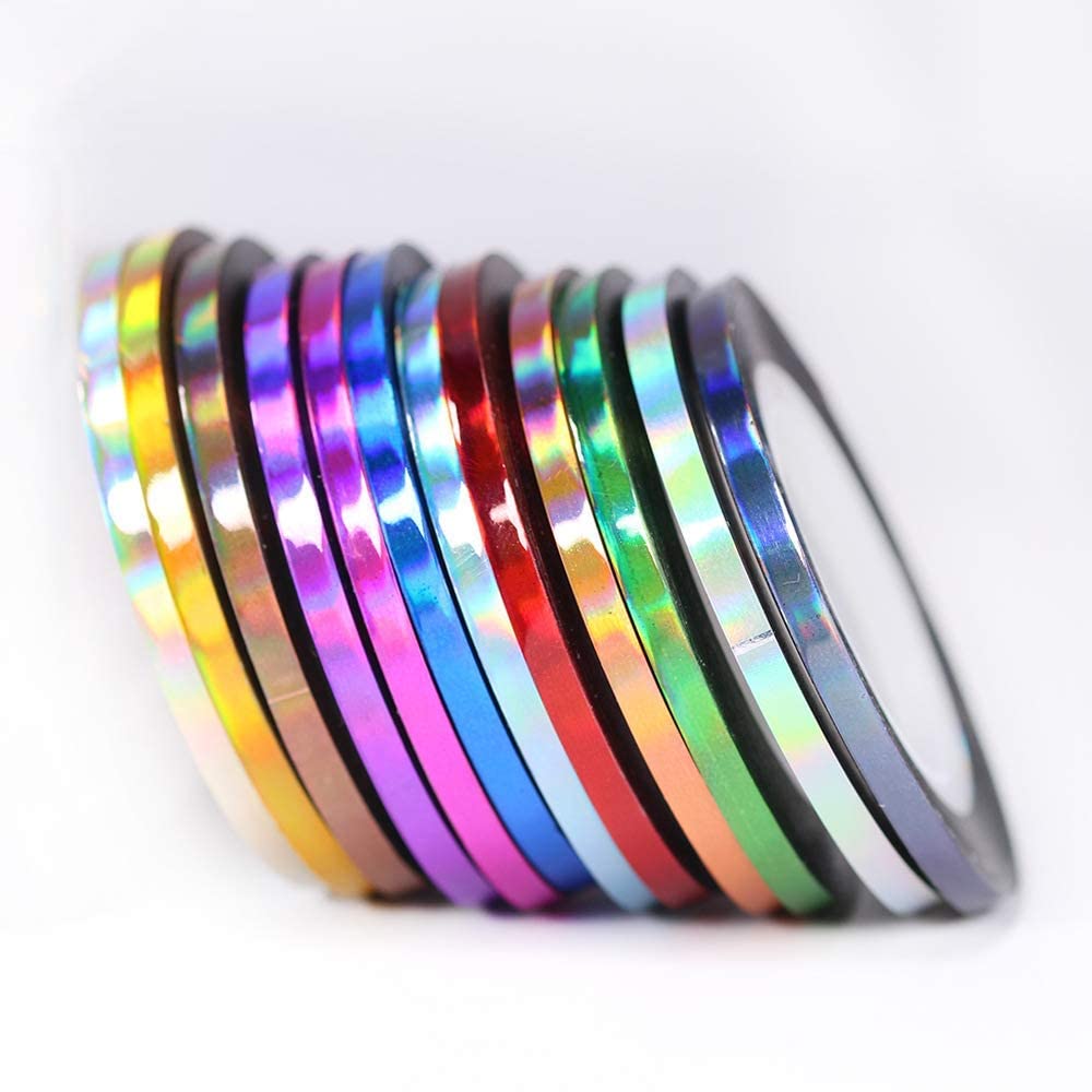Assortment of self adhesive nail art tape rolls for professional use