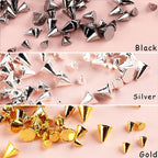 Close up view of gold silver and black alloy spike studs arranged by size for acrylic nail decoration.