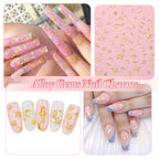 High shine gold toned alloy stars and moons nail decorations flat lay arrangement