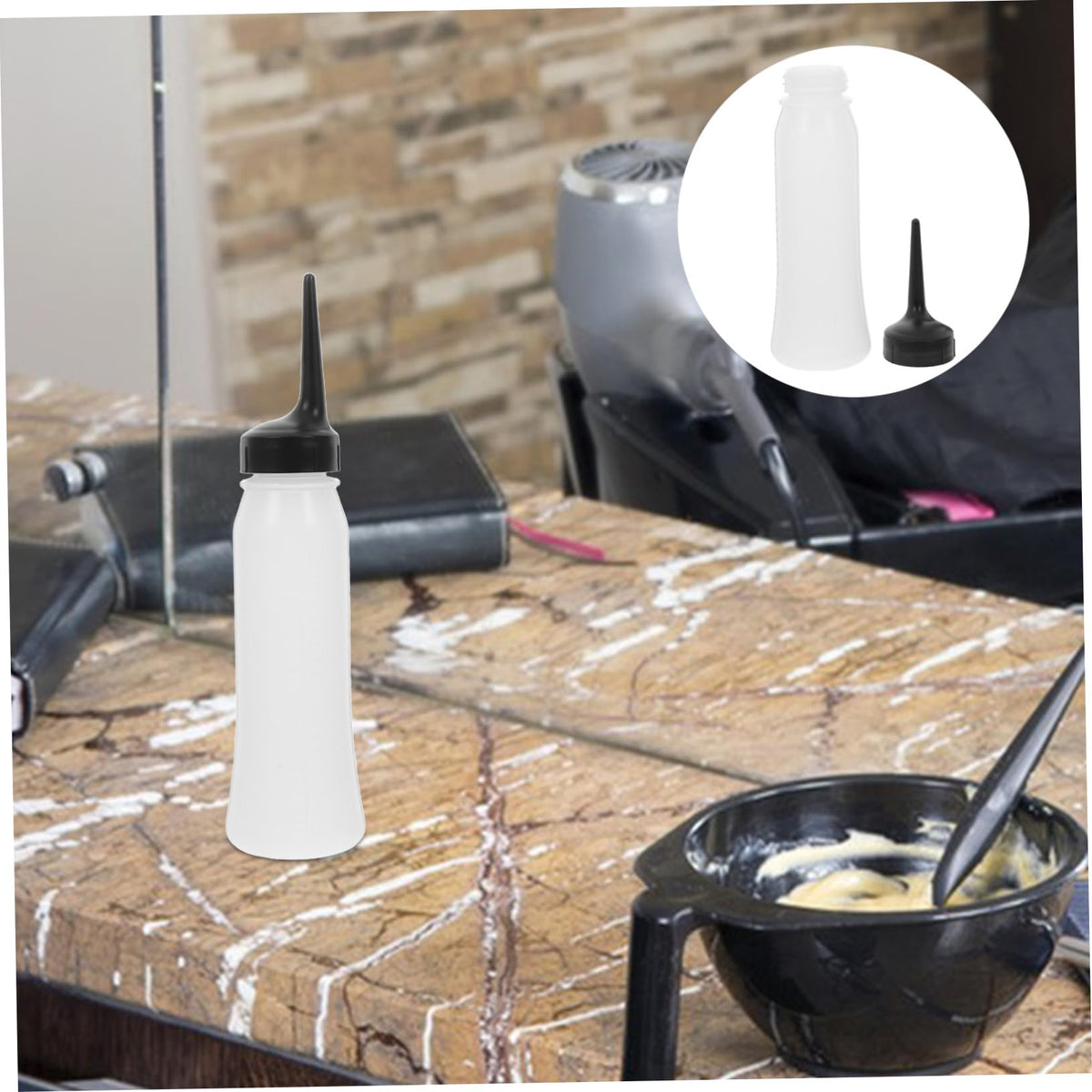 Back view of the durable plastic hair color applicator bottle highlighting the sleek design.