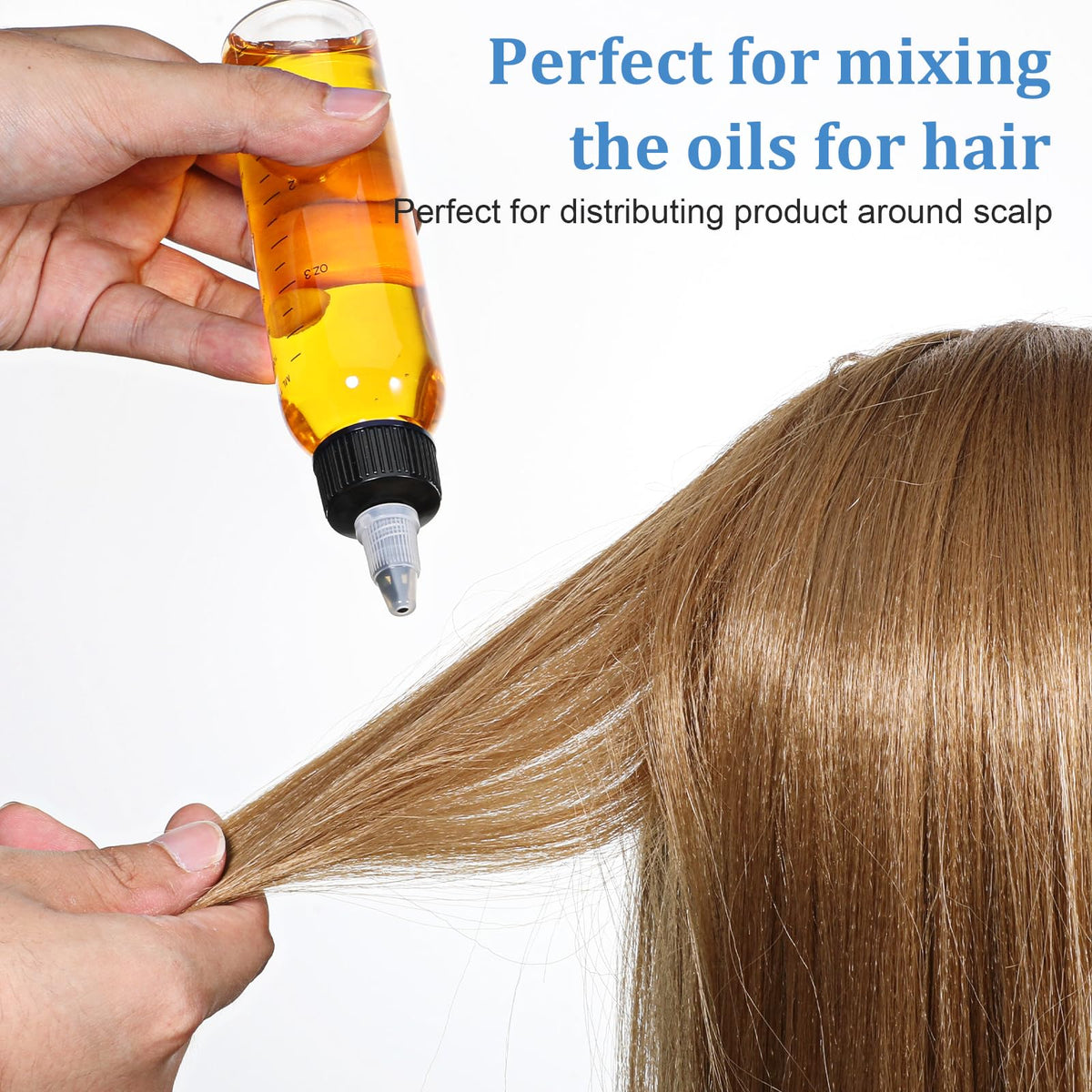 Side view of the flexible four ounce hair oil container being squeezed to demonstrate controlled fluid dispensing