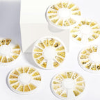 Creative DIY craft project showcasing phone case decoration using gold metallic beach theme rivets.