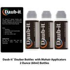 Three High Density Polyethylene two ounce bottles with mohair dauber tips detached.