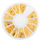Applying Mesiyun mini metal studs onto a wet gel base coat using a precise manicure styling tool.