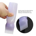 Purple hair oiling applicator bottle with built in root comb teeth for scalp application