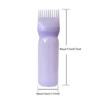 White hair dye bottle showing detailed six ounce graduated scale markings on the side