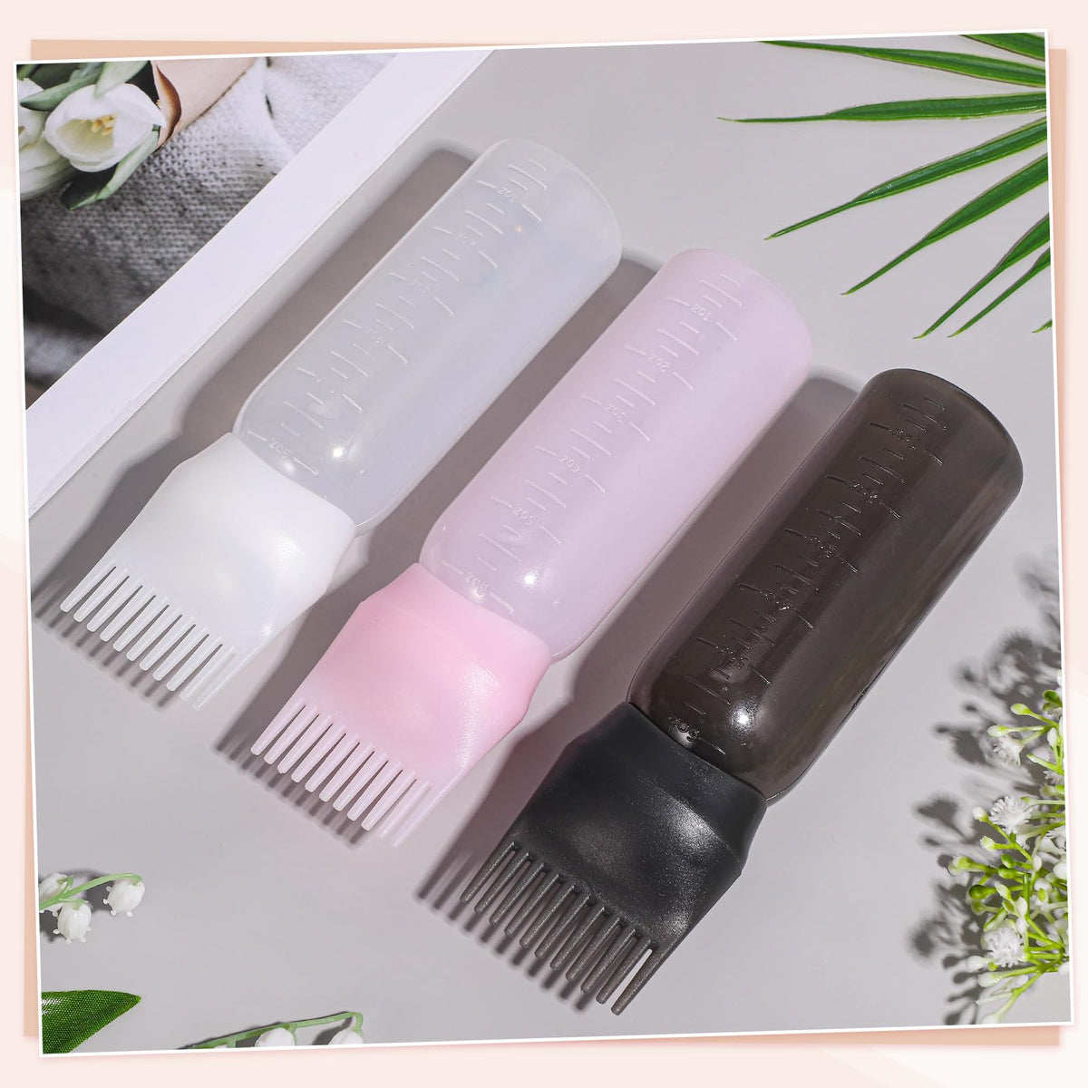 Pimoys hair oil brush bottle cap removed to display the wide opening for easy liquid refilling.