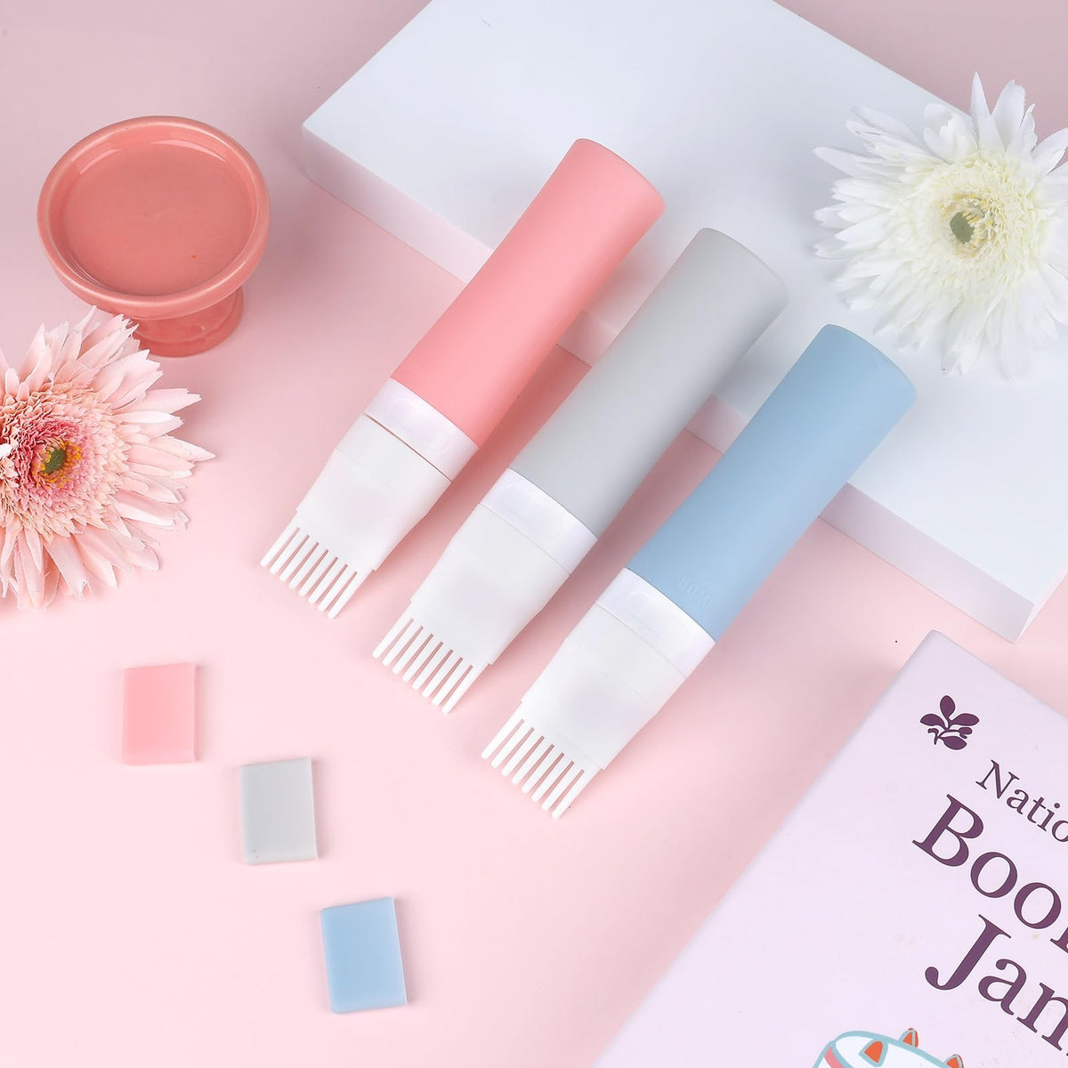 Bunrod scalp oil applicator bottle demonstrating the flexible squeezable silicone material structure