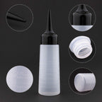 Two pack of Yebeauty hair oil applicator bottles standing side by side on a clean background
