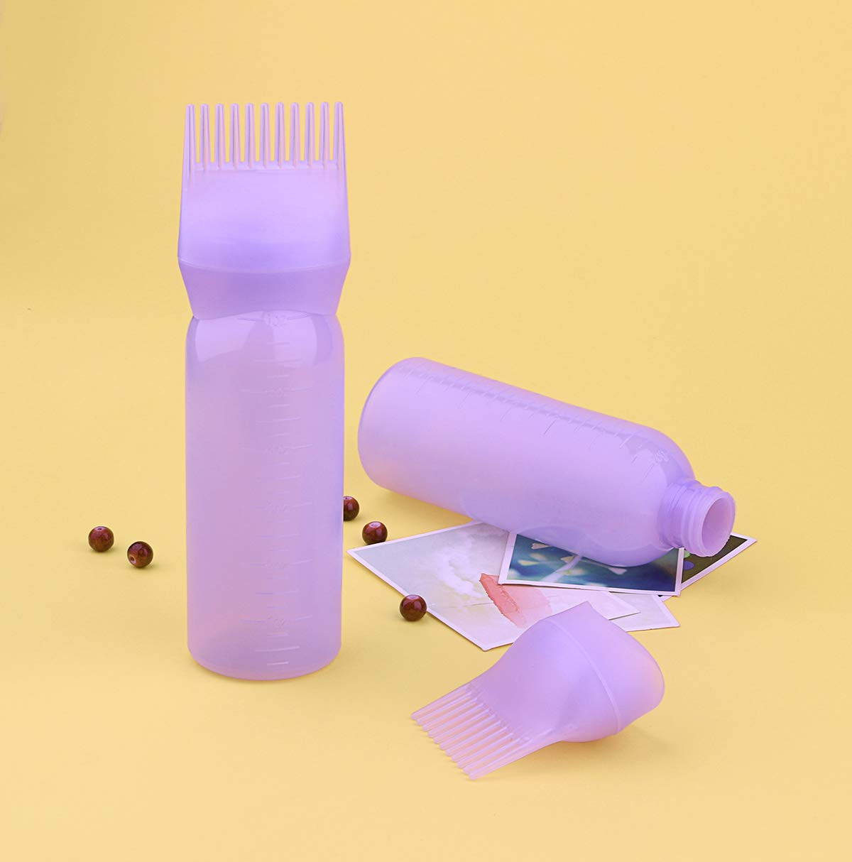 Yebeauty root applicator brush cap detached showing the liquid flow hole base