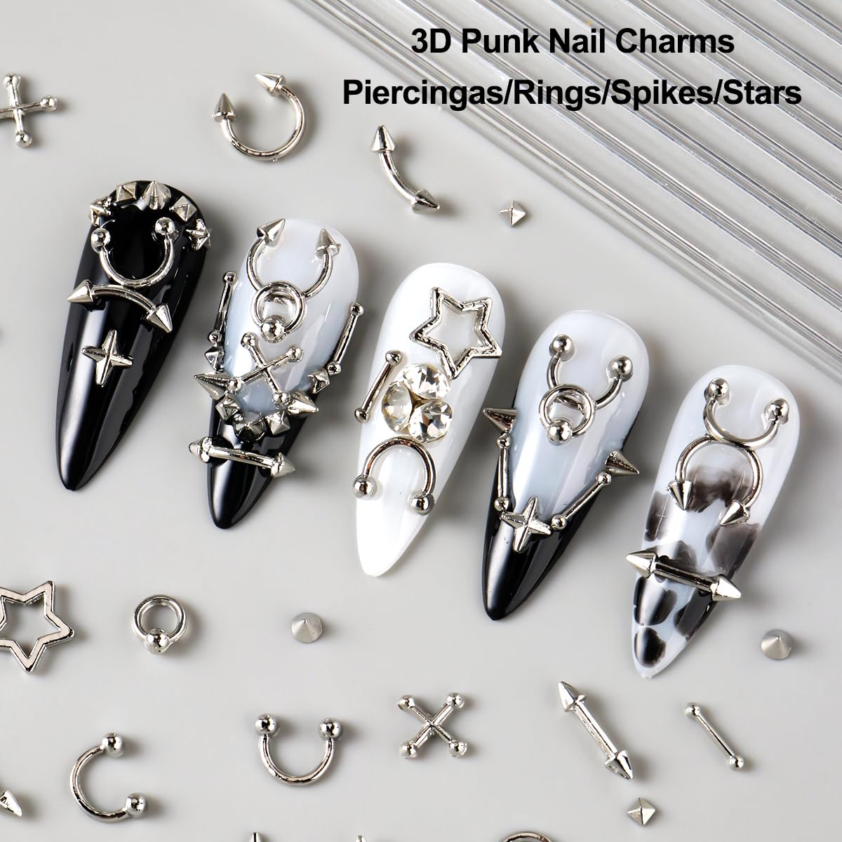 Assorted metallic cross and star charms for grunge manicures