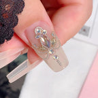 Full view of the SUTOKAKA professional manicure DIY craft kit including case and precision tweezers.