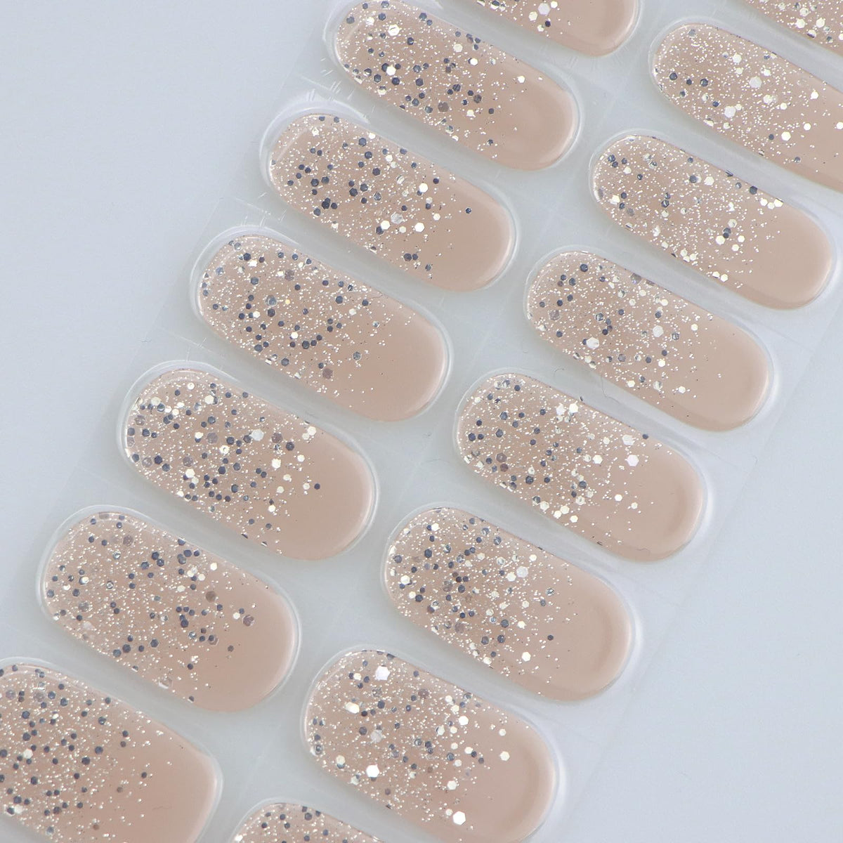 Close up of glitter gel nail sticker texture and finish