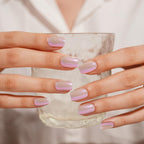 Danni & Toni gel nail strips being trimmed with a file