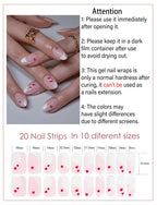 Close up view of Valentine themed gel nail stickers on natural nails