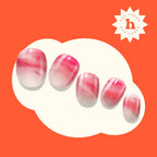 Applying Heyhae gel strips to fingernails for salon quality look