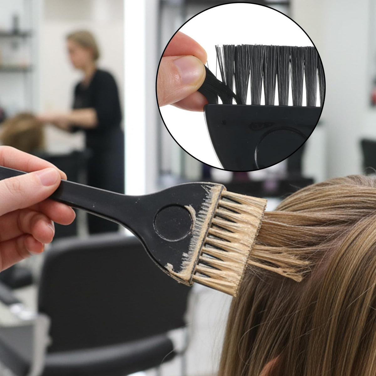 Hairstylist using balayage board for precise hair color application