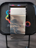 Professional hair stylist using Framar foil for highlights