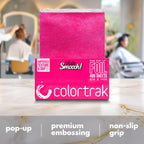 Professional hair stylist using Colortrak embossed foil