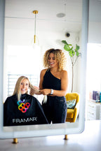 Full length view of black Framar hair coloring cape