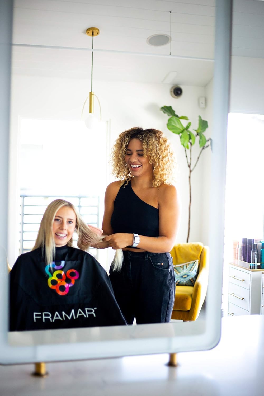 Full length view of black Framar hair coloring cape
