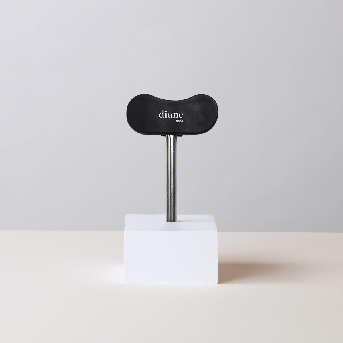 Side profile of Diane Pro Grip Color Key showing metal tube wringer mechanism.