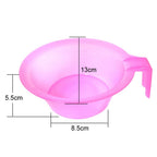 Close up view of the durable plastic material and stable base of the hair coloring applicator tool.