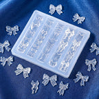 Finished 3D bow embellishments created using the Thrymme silicone carving stencil on press-on nails.
