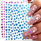 Self-adhesive heart nail stickers on a white background