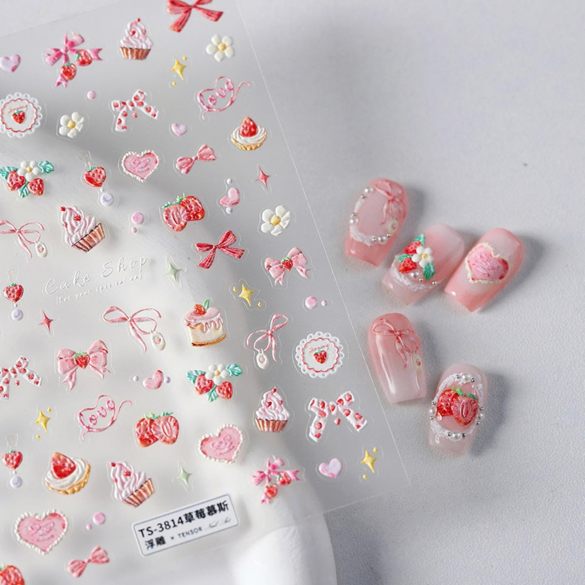 5d textured nail decorations with strawberry mousse design