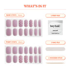 Contents of Heyhae nail kit including strips file and wooden stick
