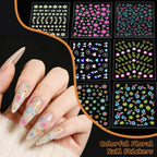 Detailed view of metallic and colorful nail design decals