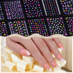 Girl applying self-adhesive nail art stickers at home