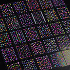 VelvetGlow nail art sticker packaging showing diverse designs