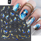 Close up of blue and gold abstract geometric nail stickers