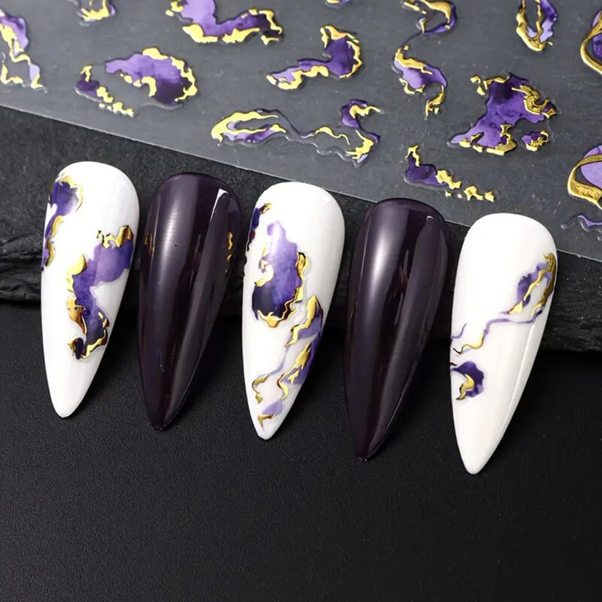 Professional manicure showing marble smoke design nail art