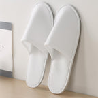 Soft fleece surface detail of Celmuron white guest slippers