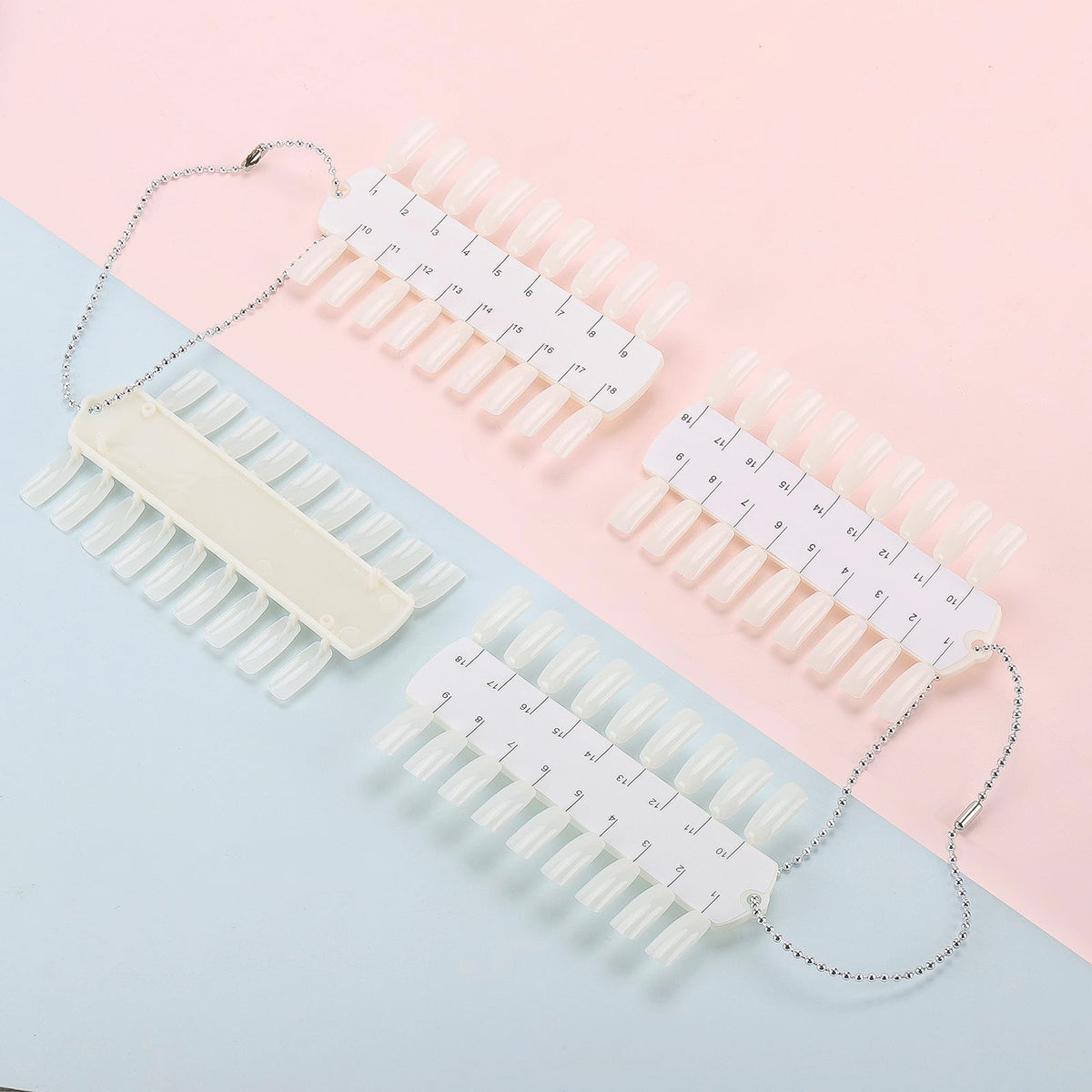 Clear plastic nail polish display tips on metal chain
