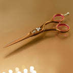Rose gold Cricket Shear Xpressions showing removable finger rest