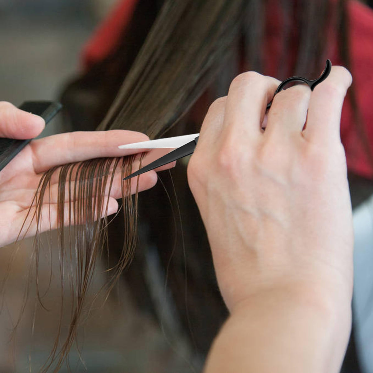Close up view of the adjustable tension screw on the EOWLEN professional hair scissors.