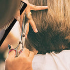 Ergonomic handles of the Fcysy professional salon shears demonstrating comfortable finger grip design