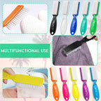 Assorted pink and white household utility nail brushes being used for cleaning surfaces.