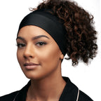 Evolve hair cap displayed on packaging for curly hair care