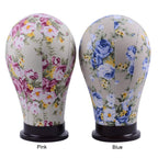 Side angle of 23 inch floral canvas mannequin head highlighting the durable knitted outer fabric